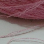 carnation pink yarn strand