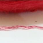 red cotton yarn strand