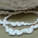 white popcorn yarn strand