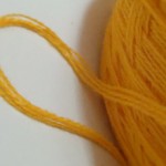 yellow orange yarn strand